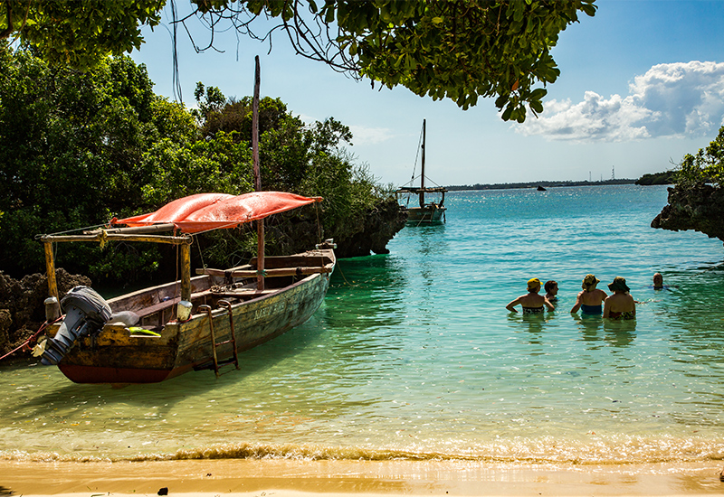 Zanzibar guests swimming in the warm Indian Ocean