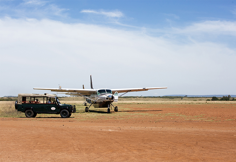 Small aircraft landing in the Masai Mara National Park. 
