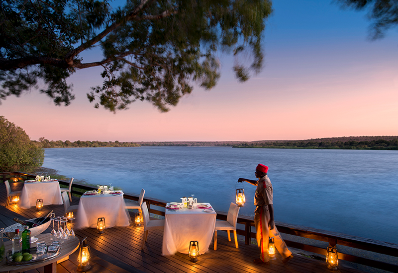 Dining experience on the deck at Royal Chundu Zambezi River Lodge