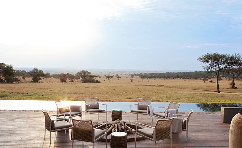 Evenings spent around a fire-pit beneath the African Sky is part of your family-friendly safari at Singita Serengeti House