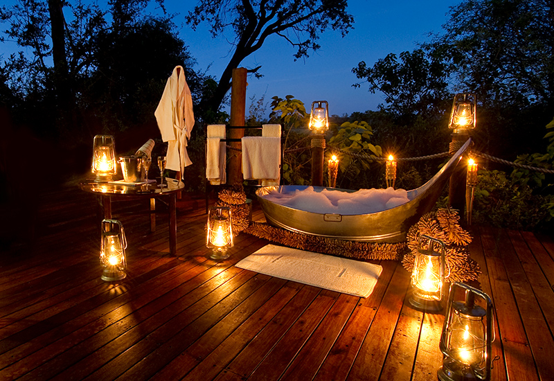 a bath tub at the elevated suites at Baines camp - a top 10 luxury lodge in Africa