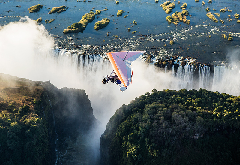 Microlight flying over the Victoria Falls