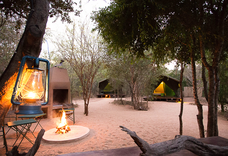 camp fire at tydon safari camp kruger national park