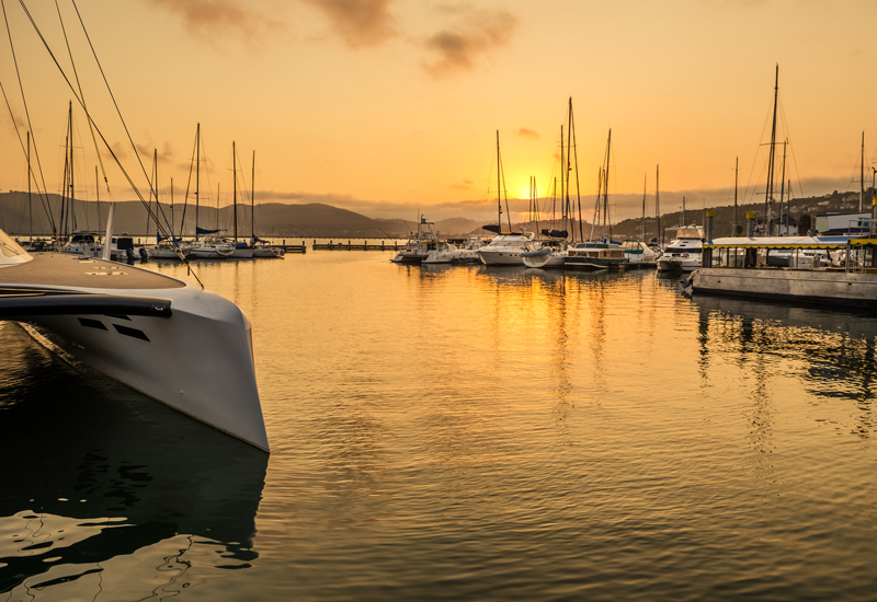 Knysna boats in the harbor at sunset 