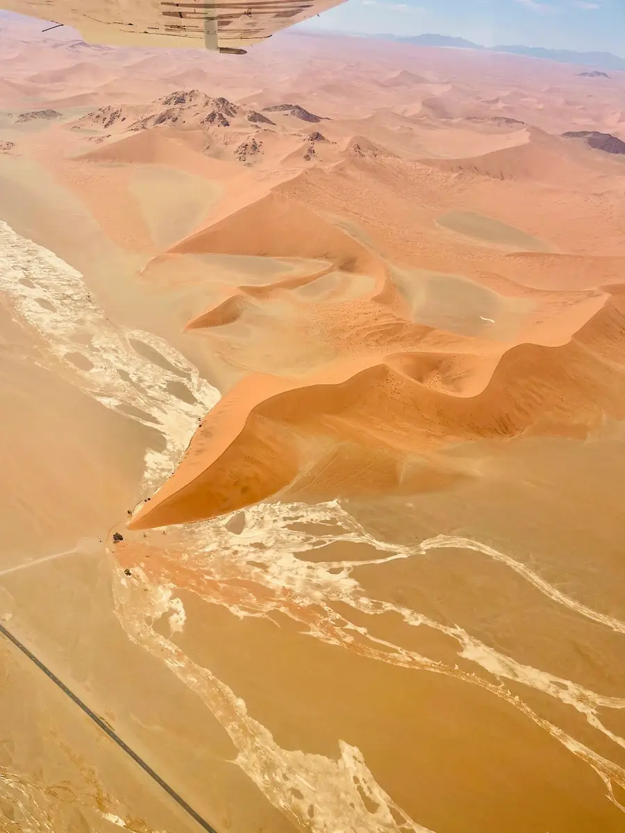 Our UK guests traveled by private flights from Windhoek to Sossusvlei and Swakopmund. At &Beyond Sossusvlei Desert Lodge, they enjoyed stunning desert views, cycling, quad biking, and the rare sight of desert rain—the first in 10 years