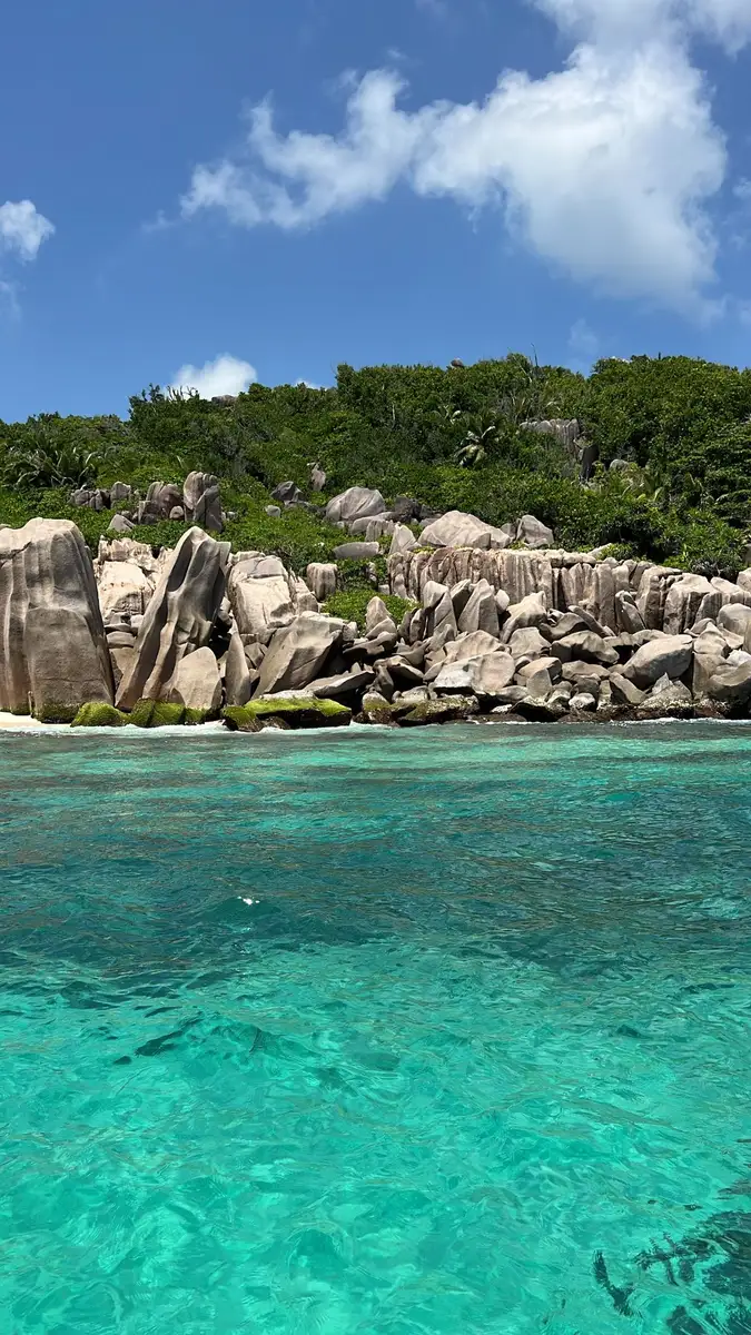 Our CEO at SAFARI.COM and his wife visited La Digue to test their service. They arrived by helicopter, cycled around the island daily, toured all the beaches by private boat, and enjoyed close-up encounters with tortoises.